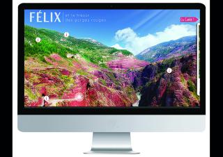 Photo d'un écran d'ordinateur sur lequel est affiché une photo d'un paysage naturel. On peut lire "Félix et le trésor des gorges rouges"